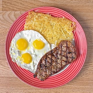 10 Oz New York Steak + 3 Eggs